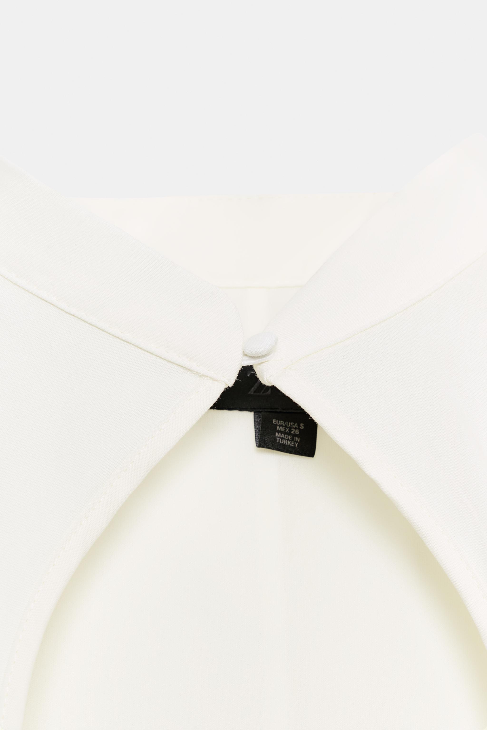 POLKA DOT STAND COLLAR TOP WITH OPENING