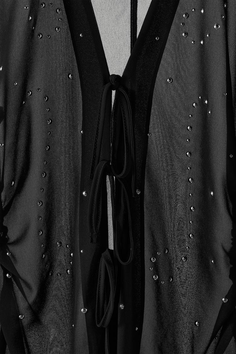 Camisa semitransparente con tachuelas 4