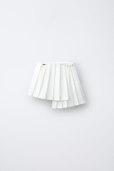 FALDA PLISADA ASIMÉTRICA PENN © - Blanco de Zara