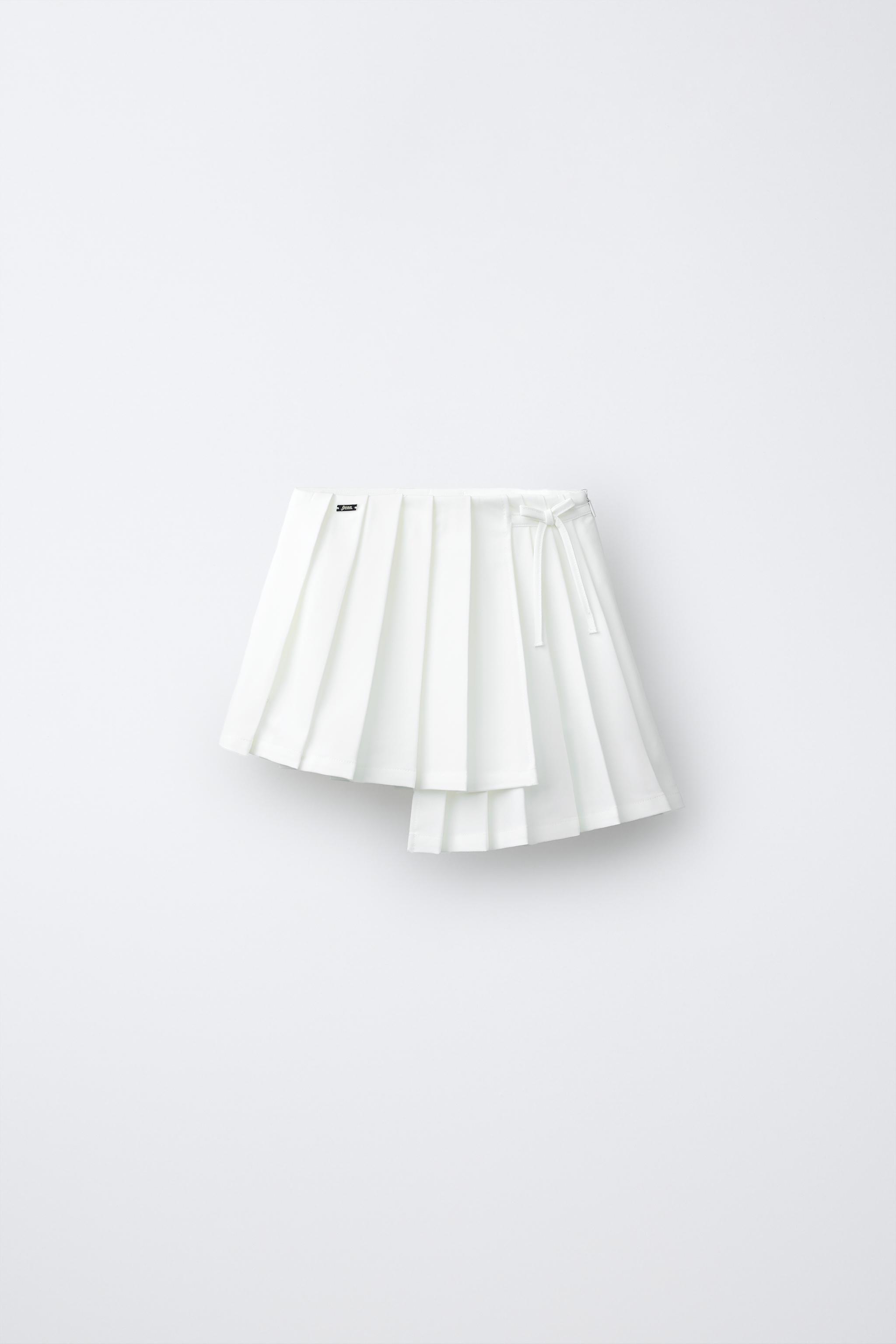 PENN © ASYMMETRIC PLEATED SKIRT
