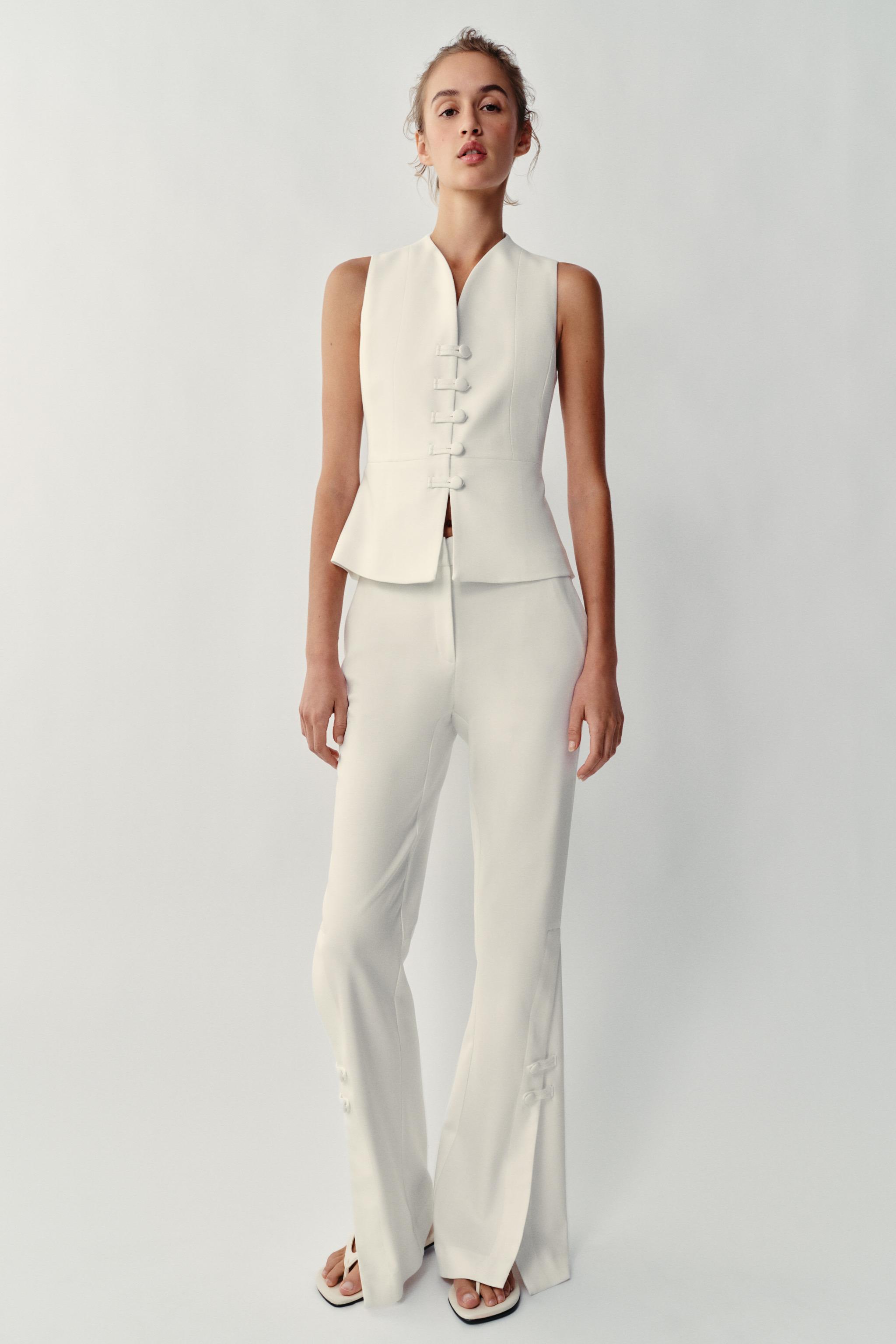 PANTS WITH SLIT HEMS