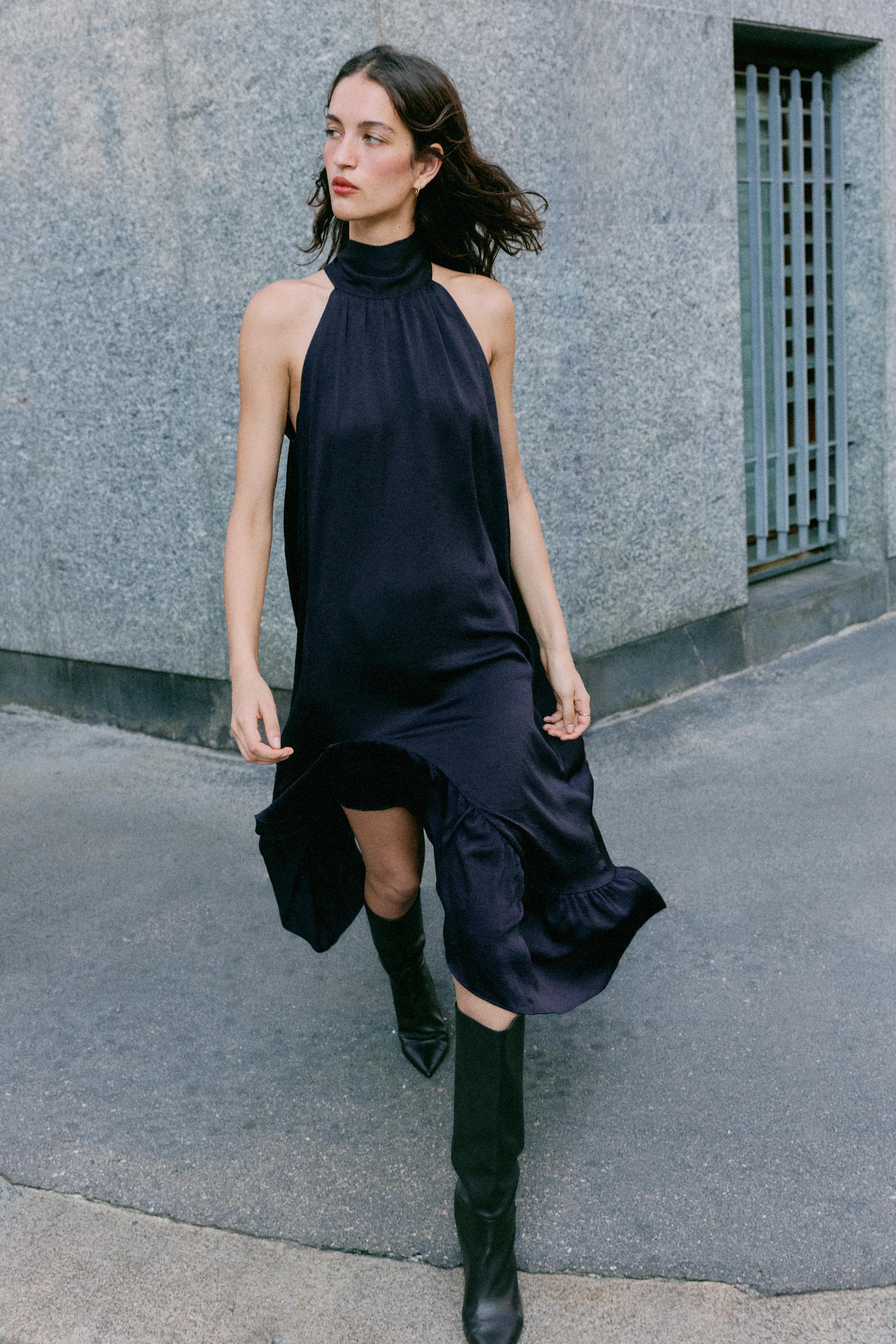 ROBE MI-LONGUE HALTER VOLANT BAS