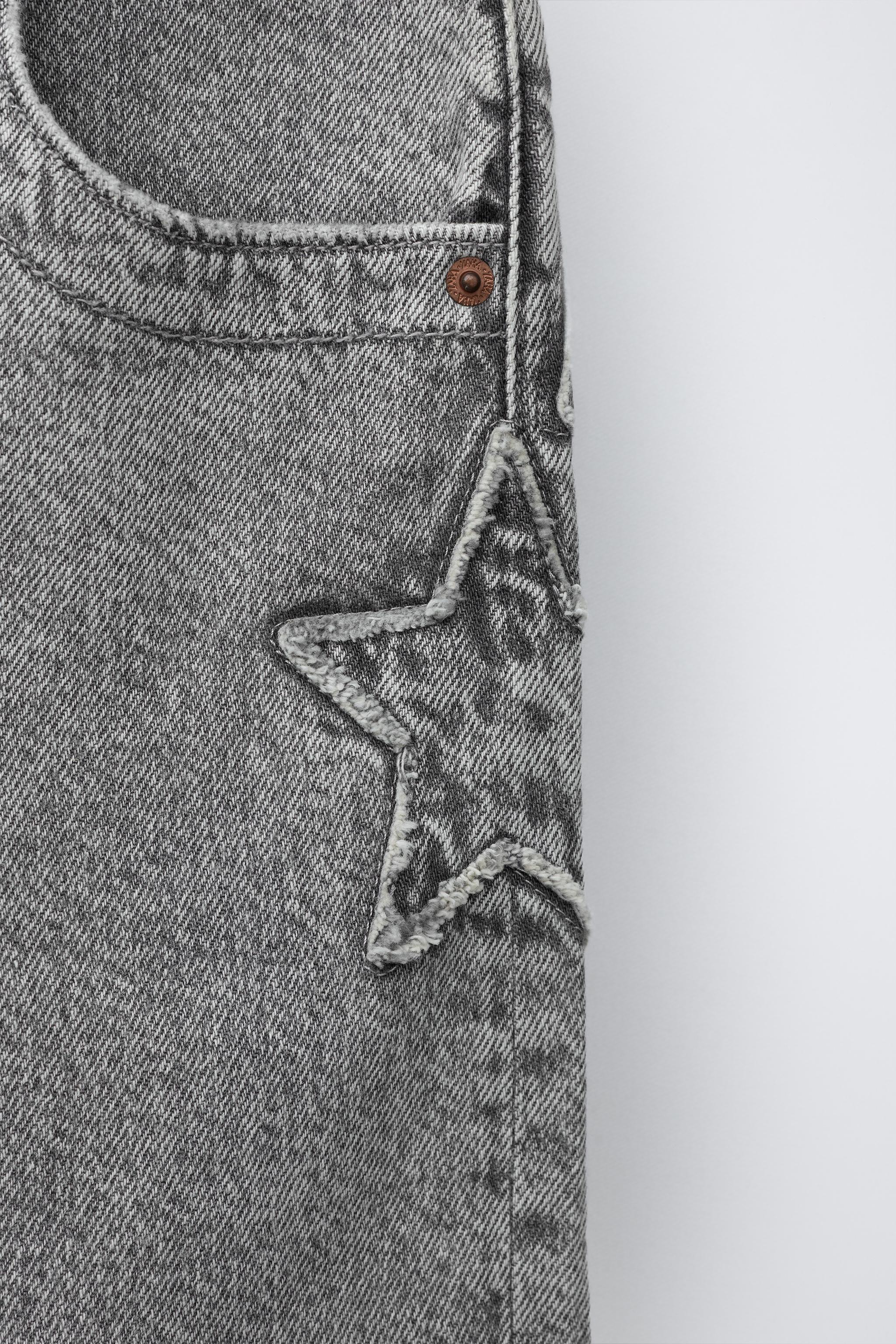 SHORT EN JEAN ÉTOILE ET INSCRIPTION