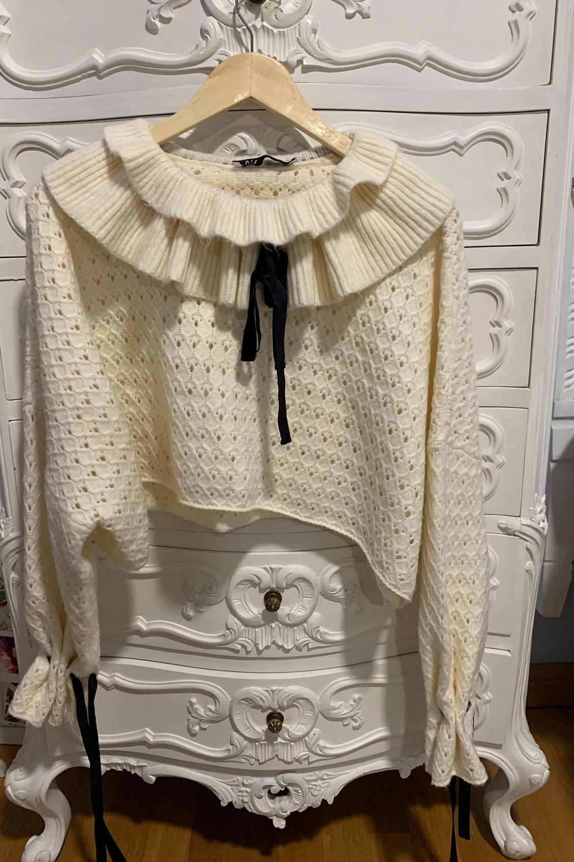 KNIT SWEATER WITH RUFFLE TRIMS