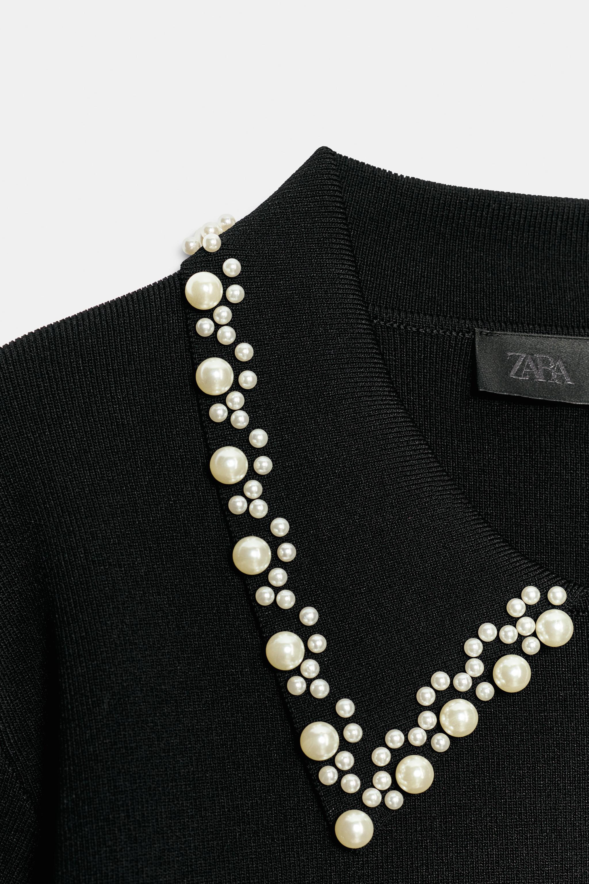 POLO EN MAILLE AVEC PERLES