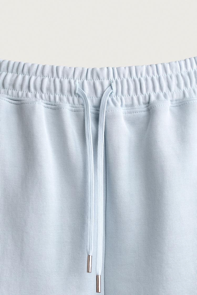PANTALÓN CORTO BERMUDA TIPO JOGGER DE TEJIDO INTERLOCK CON CORTE RELAJADO 7