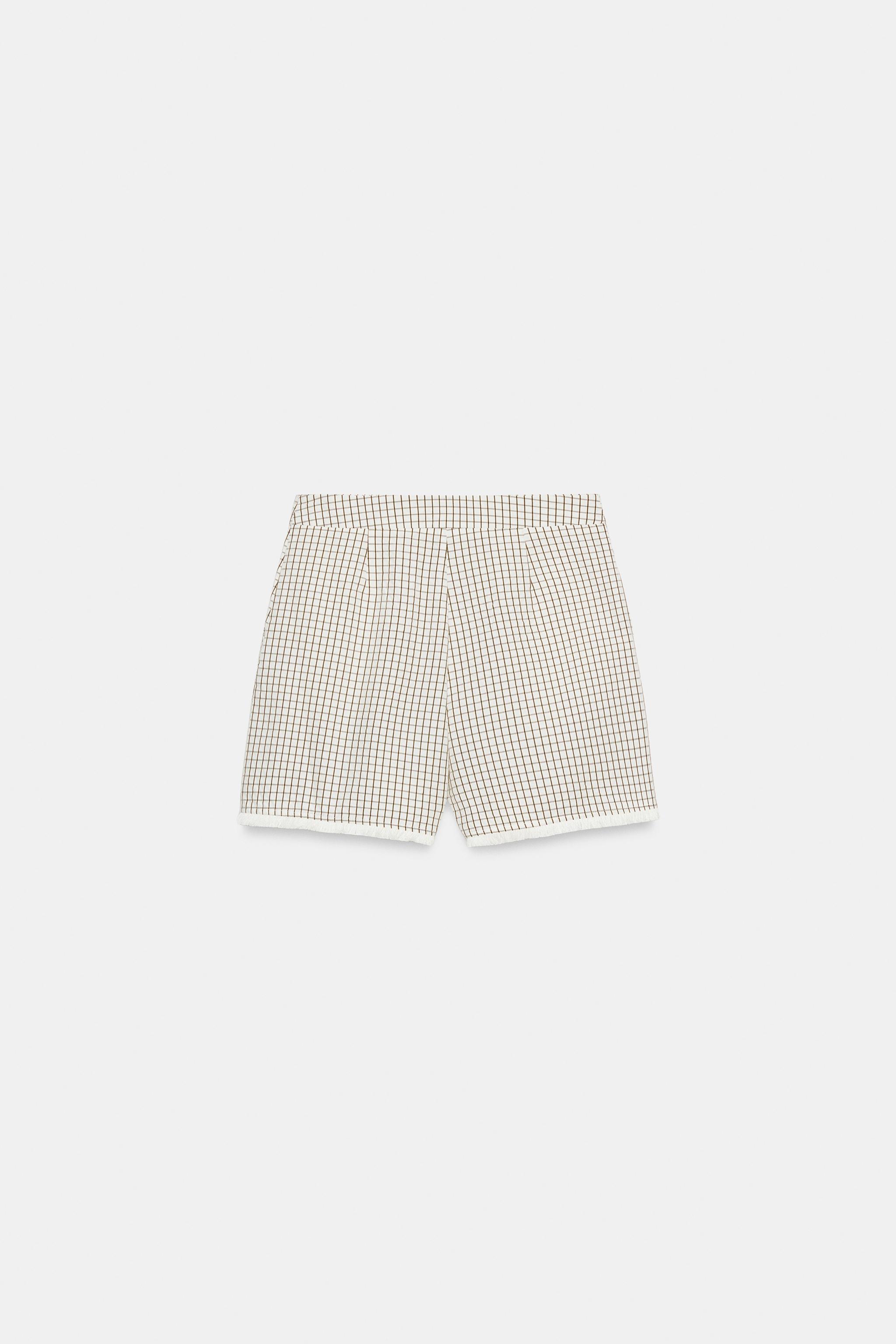 SHORT À CARREAUX EFFRANGÉ