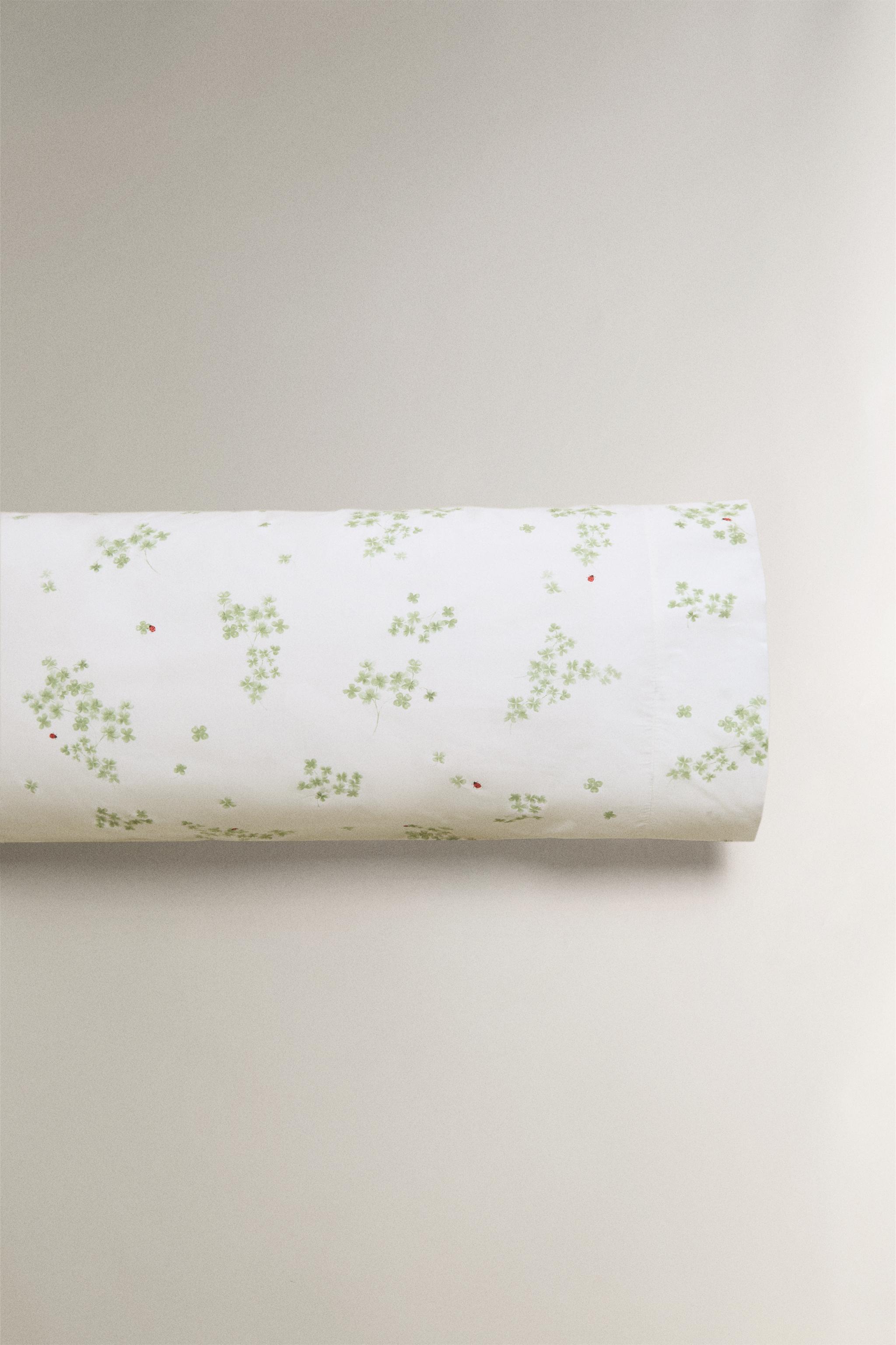 TAIE D'OREILLER PERCALE TRÈFLES ET COCCINELLES