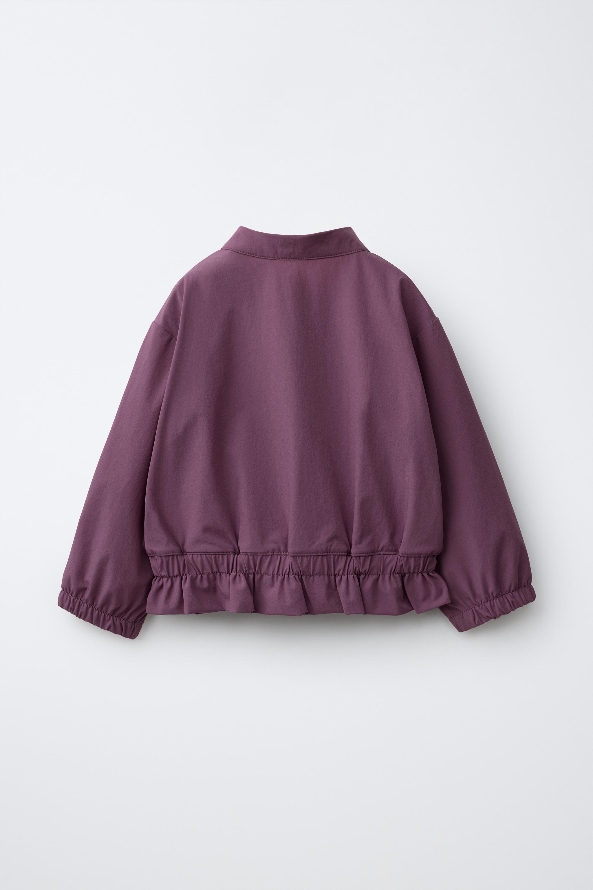 VESTE TECHNIQUE À VOLANT