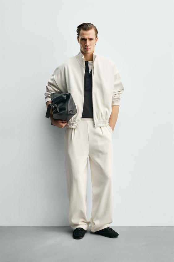 PLEATED WIDE FIT JOGGER PANTS