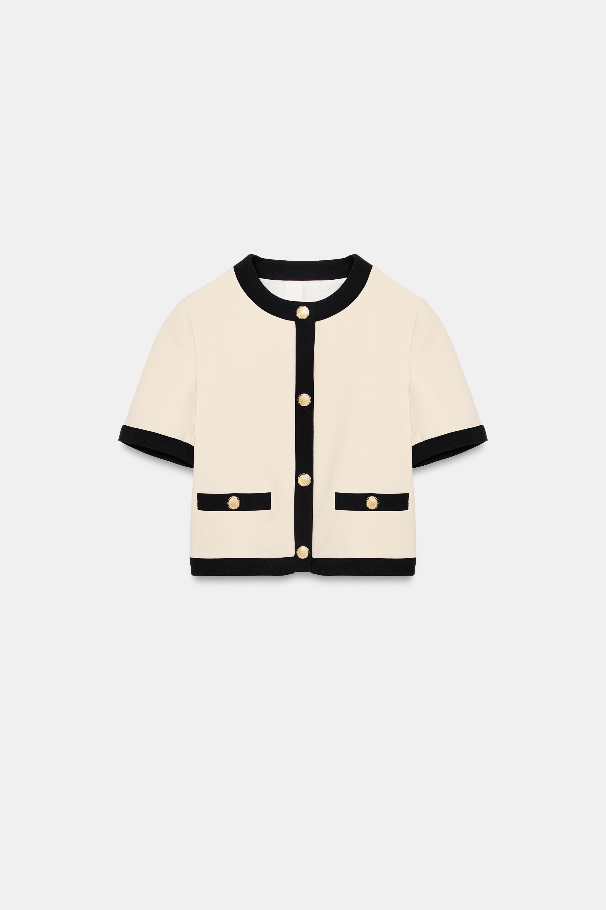 VESTE MANCHES COURTES