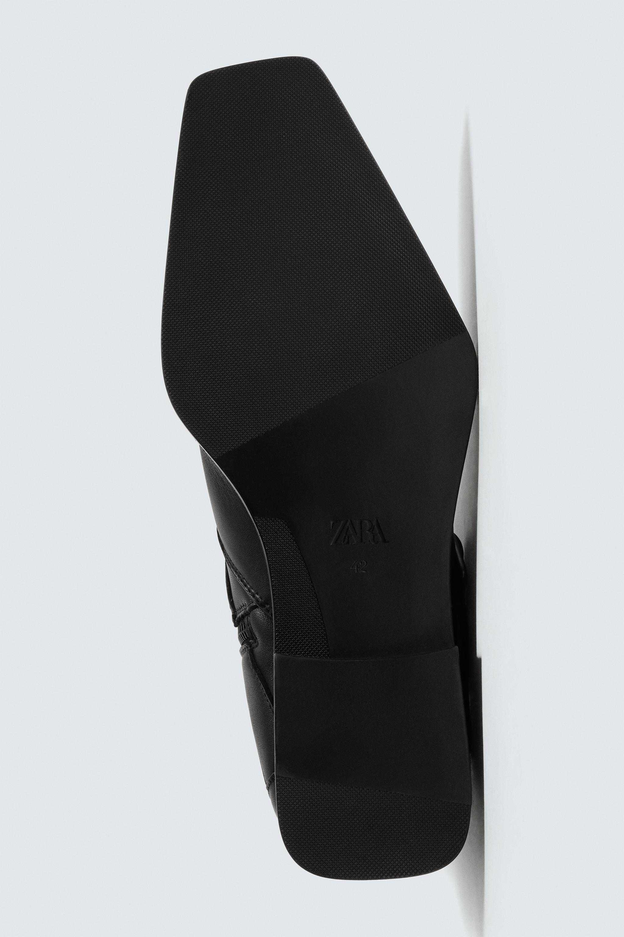 LEATHER BUCKLE BOOTS