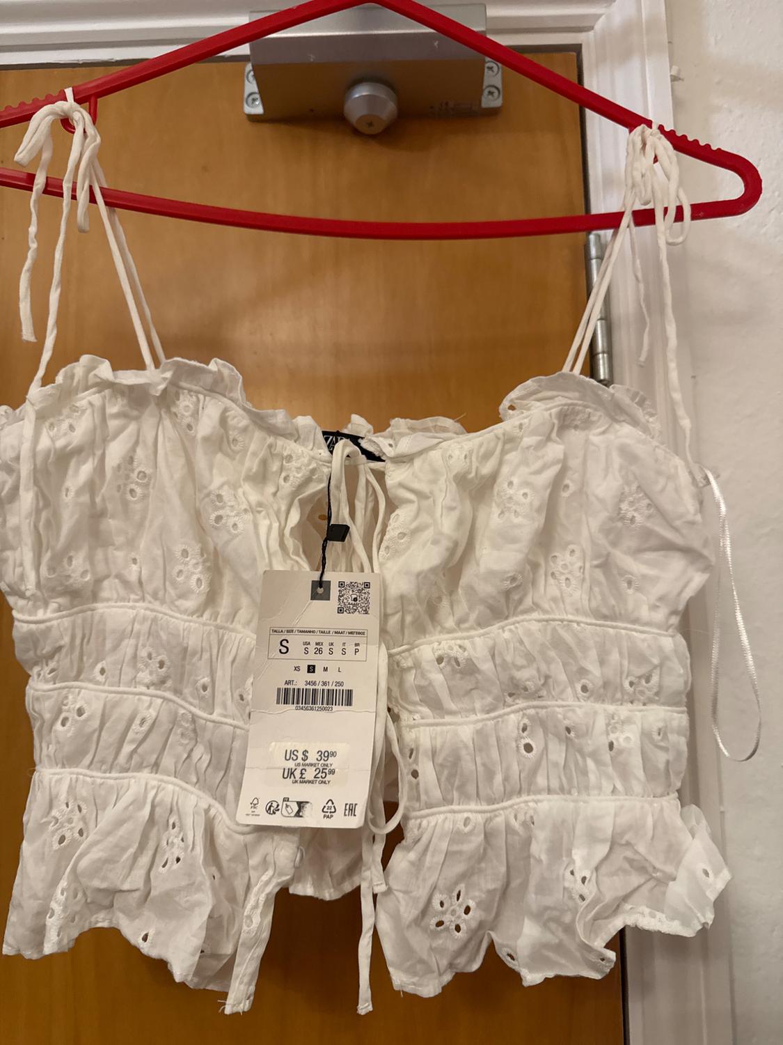 TOP WITH CUTWORK EMBROIDERY AND BOWS - Image 3