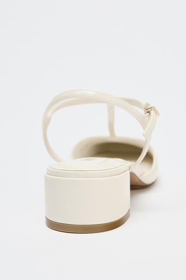 CHAUSSURES OUVERTES À L'ARRIÈRE À BRIDES EFFET VERNI - Blanc de Zara - Image 5