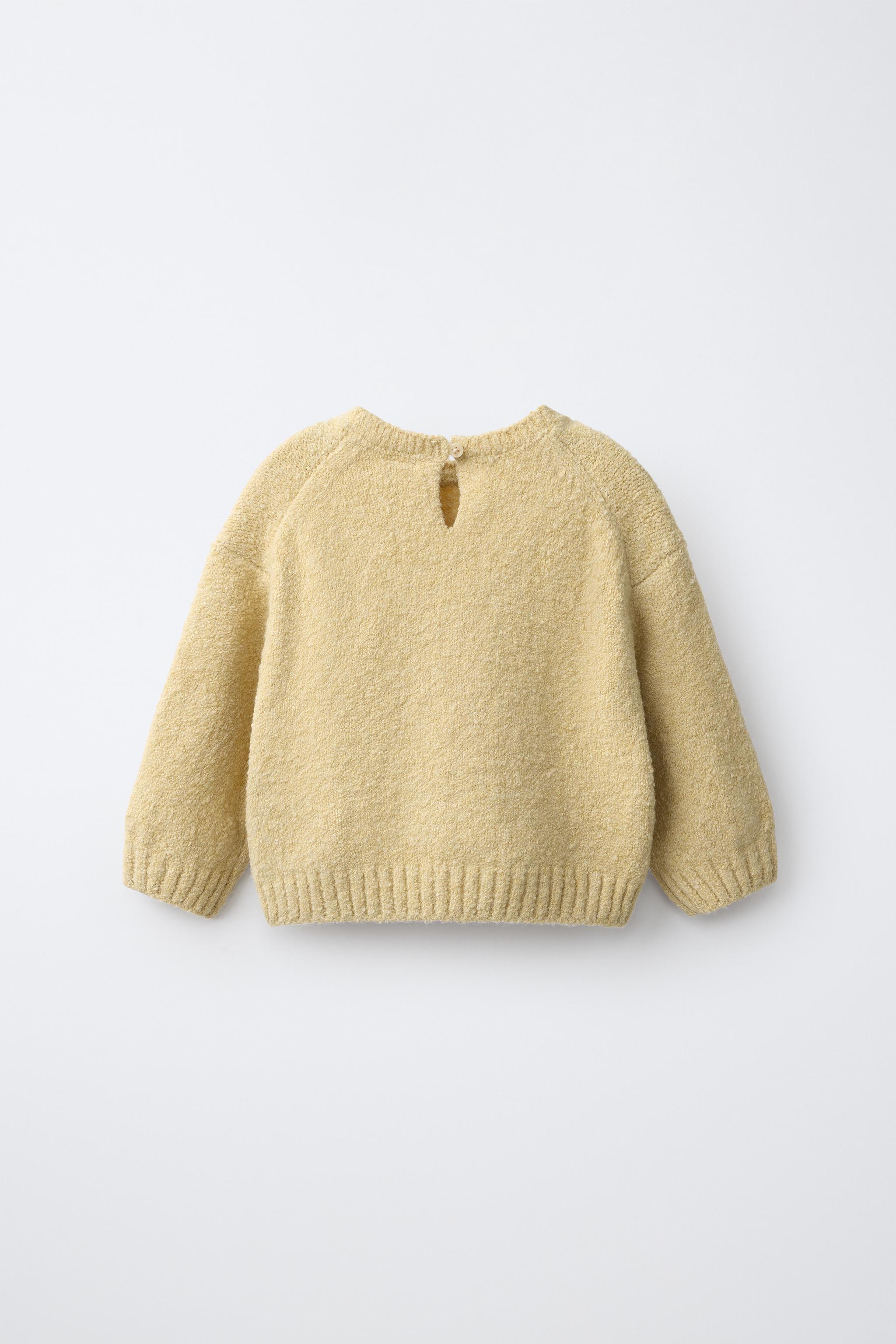 PULL EN MAILLE À FLEURS BRODÉES