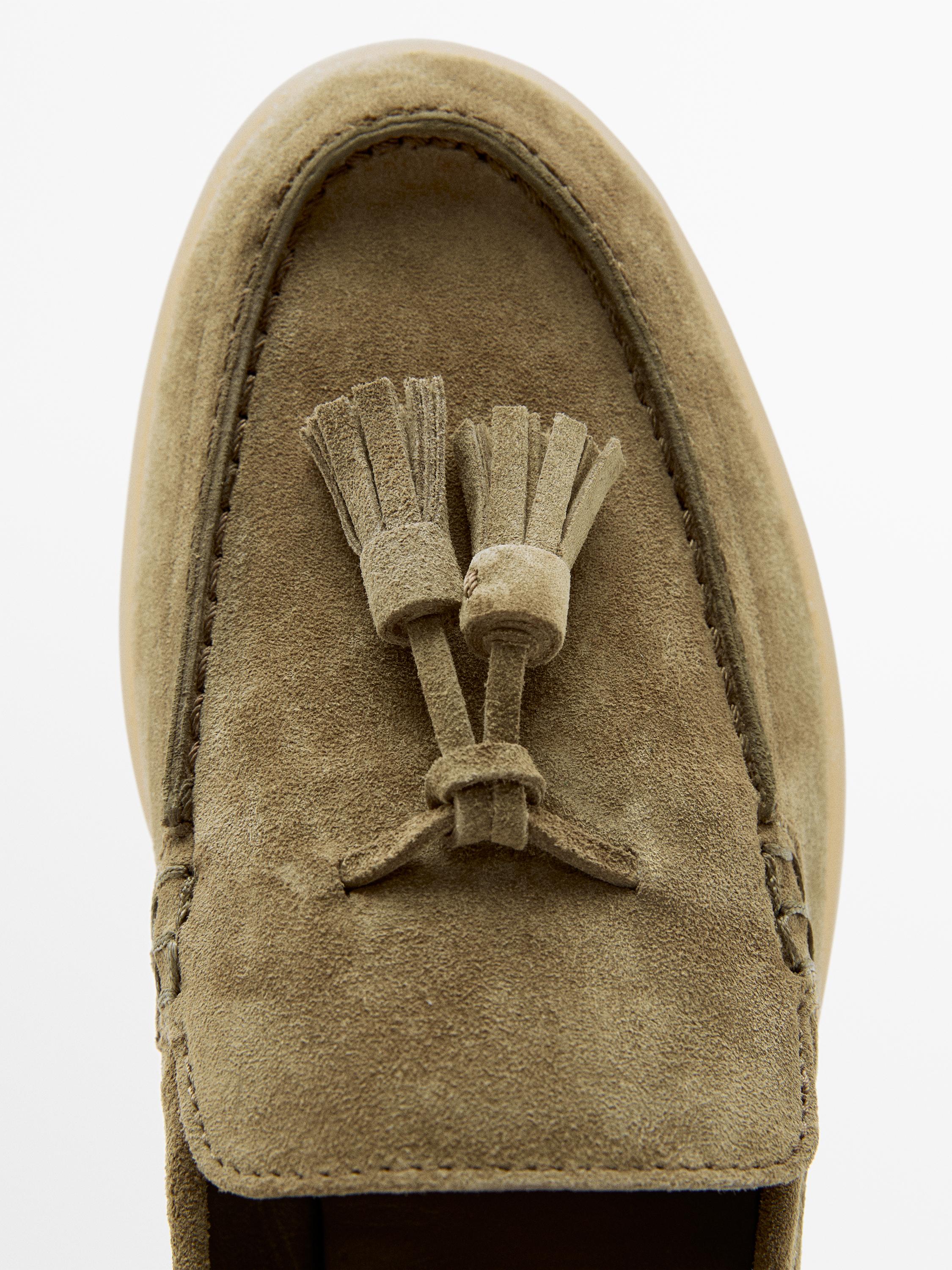 Split leather loafers with tassels