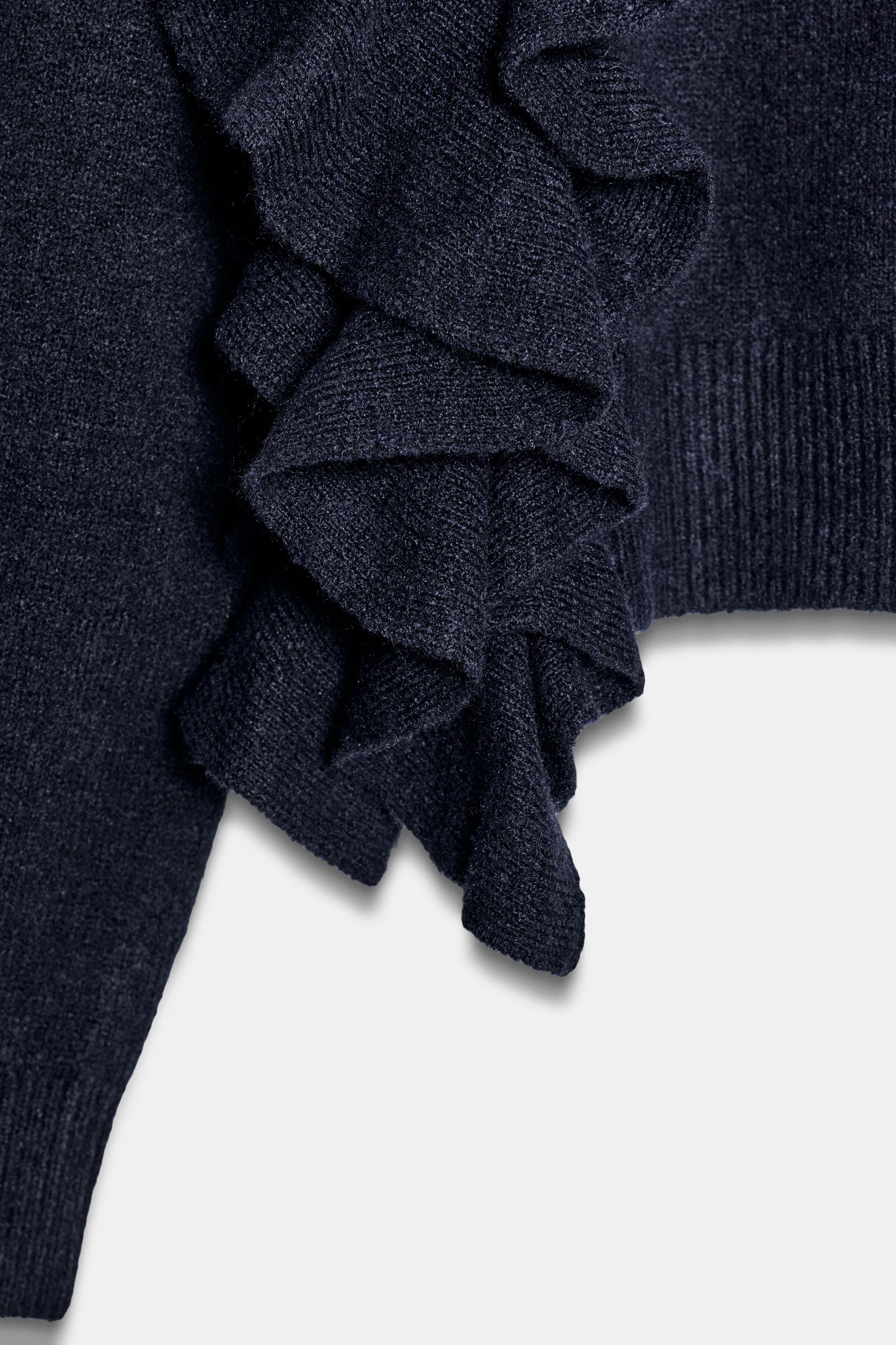 PULL EN MAILLE À VOLANTS