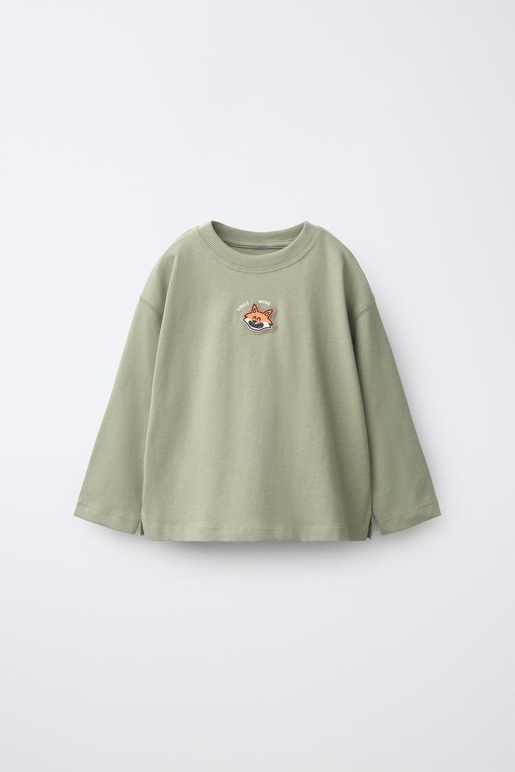 Camiseta parche engomado rinoceronte