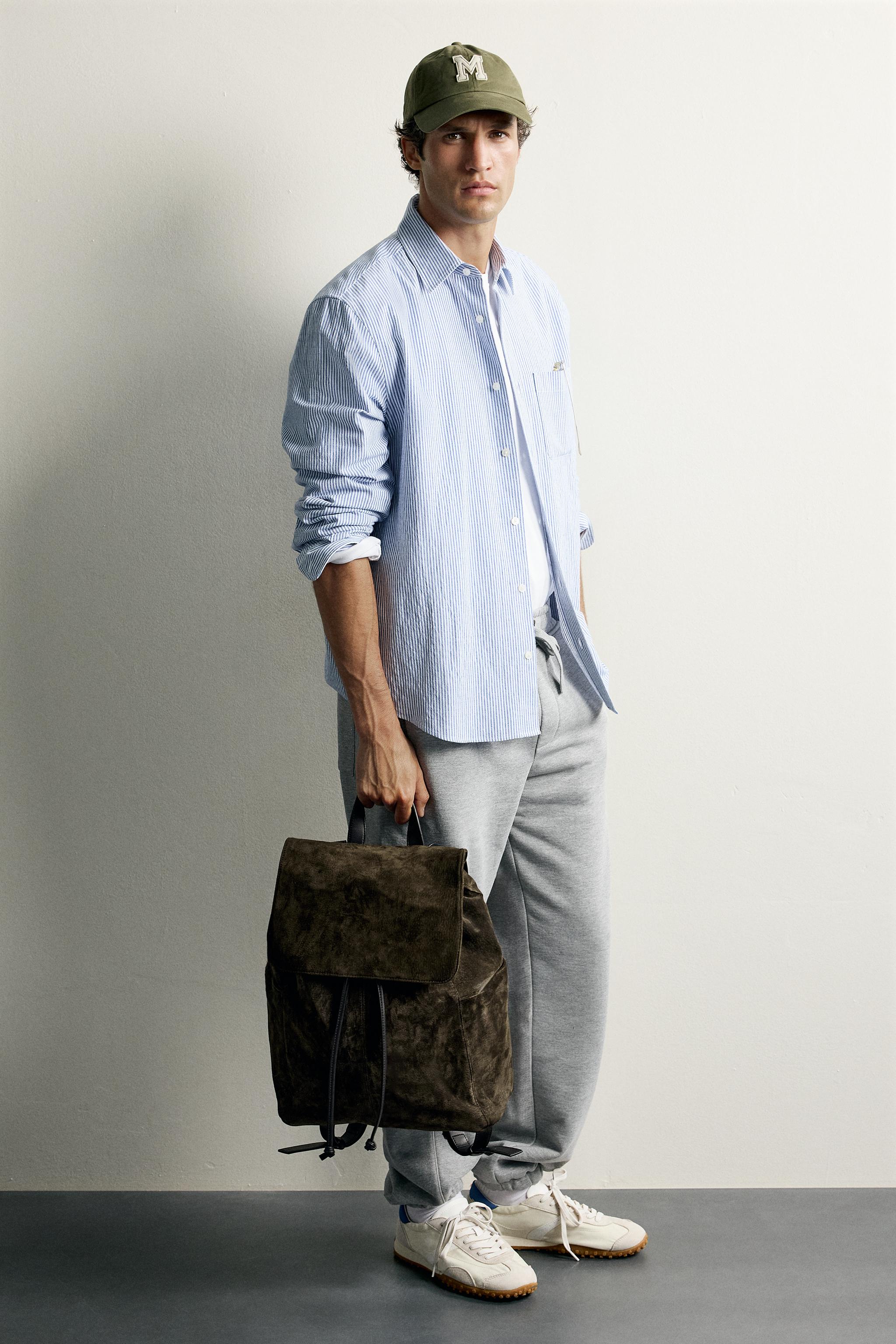 LEATHER FLAP BACKPACK