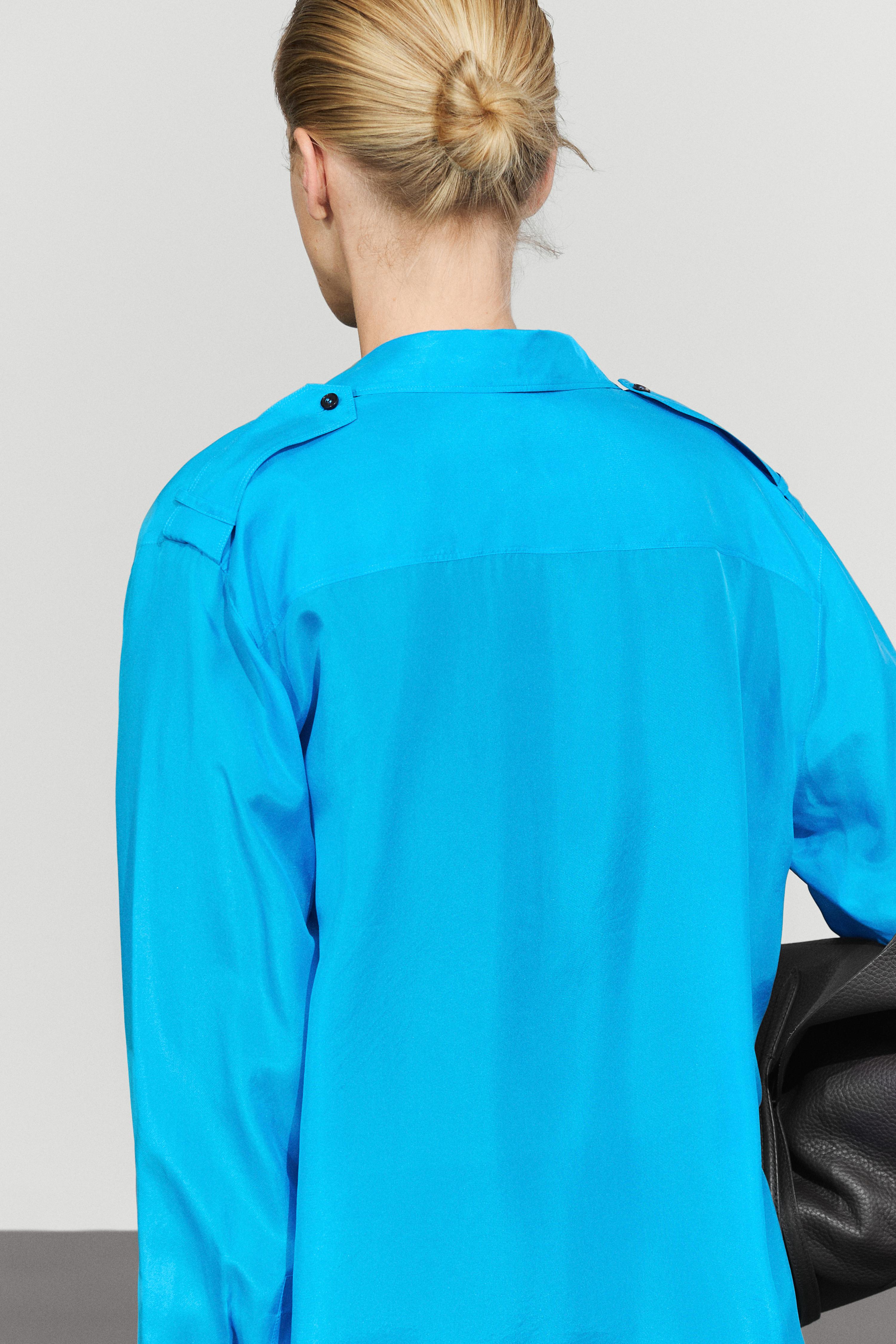 100% silk flowing shirt with shoulder detail