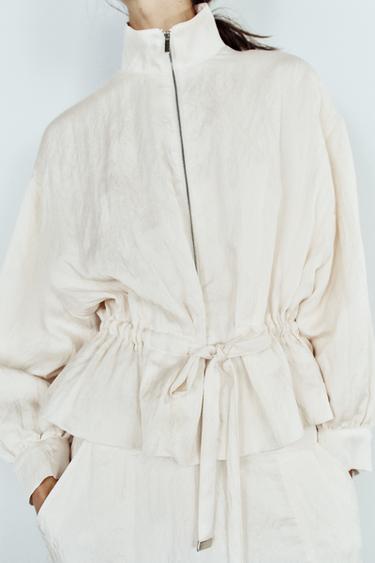 CRUMPLED EFFECT DRAWSTRING BOMBER JACKET — Ecru 1