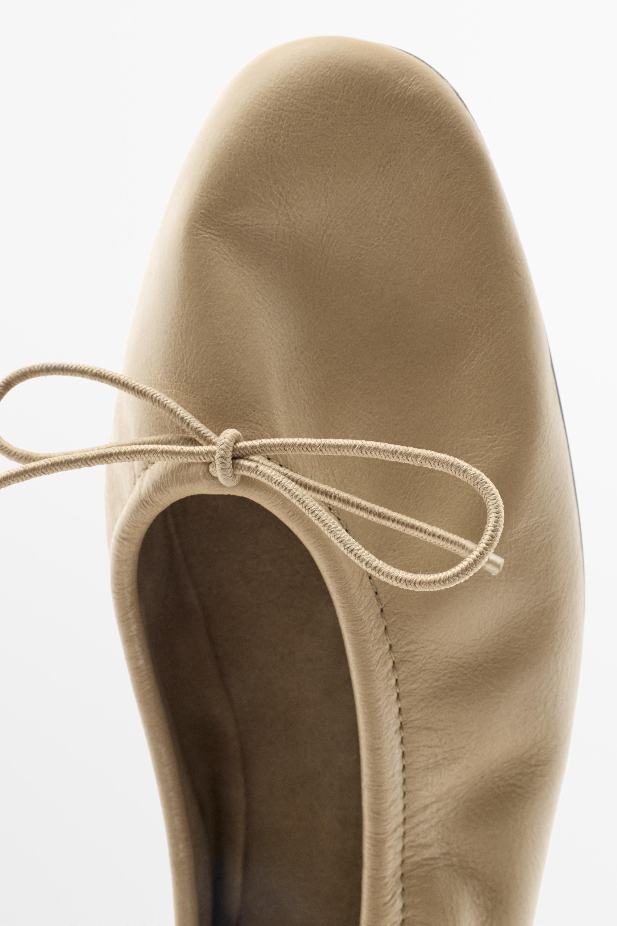 Ruched bow leather ballet flat