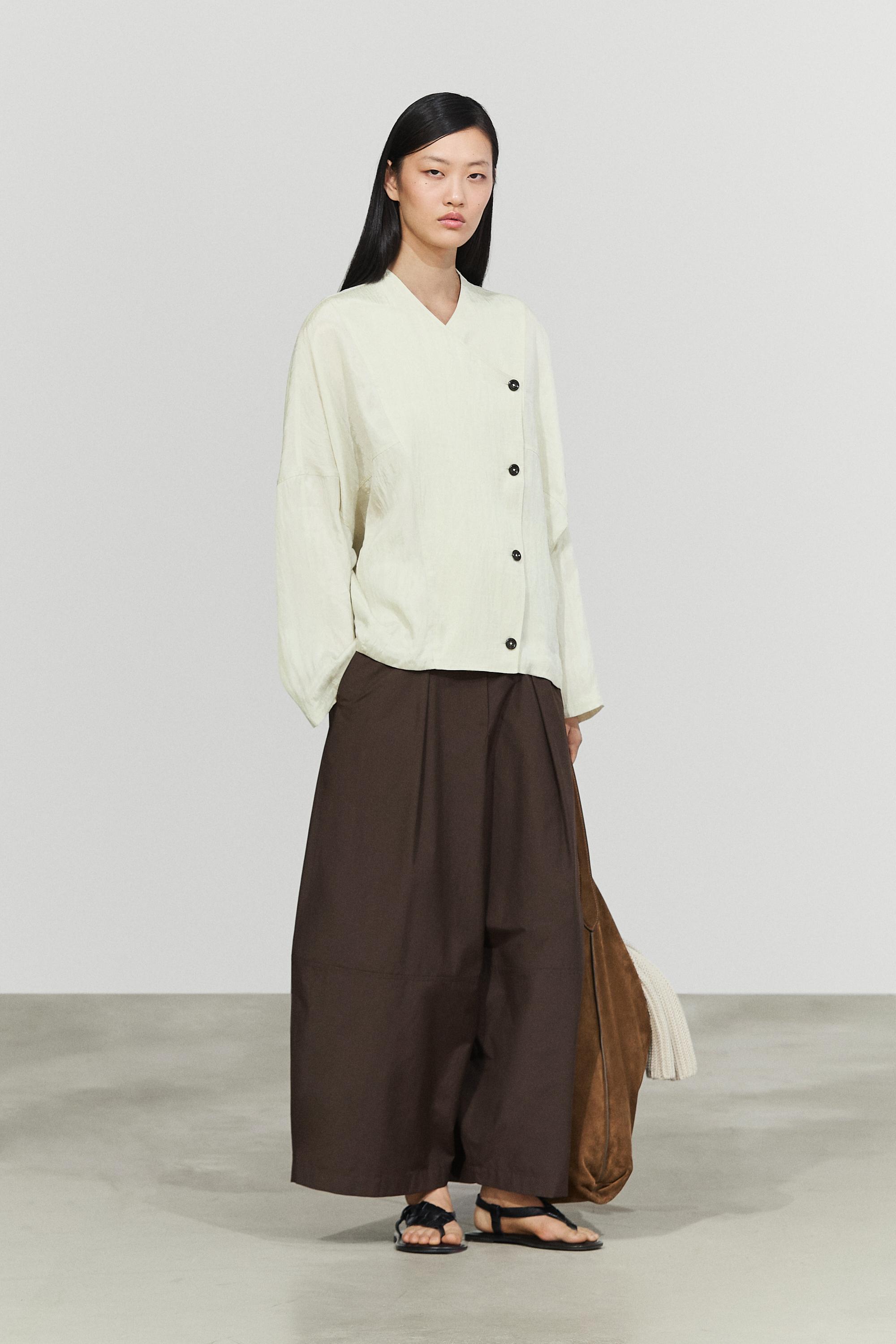 Fluid wrap shirt with button detail