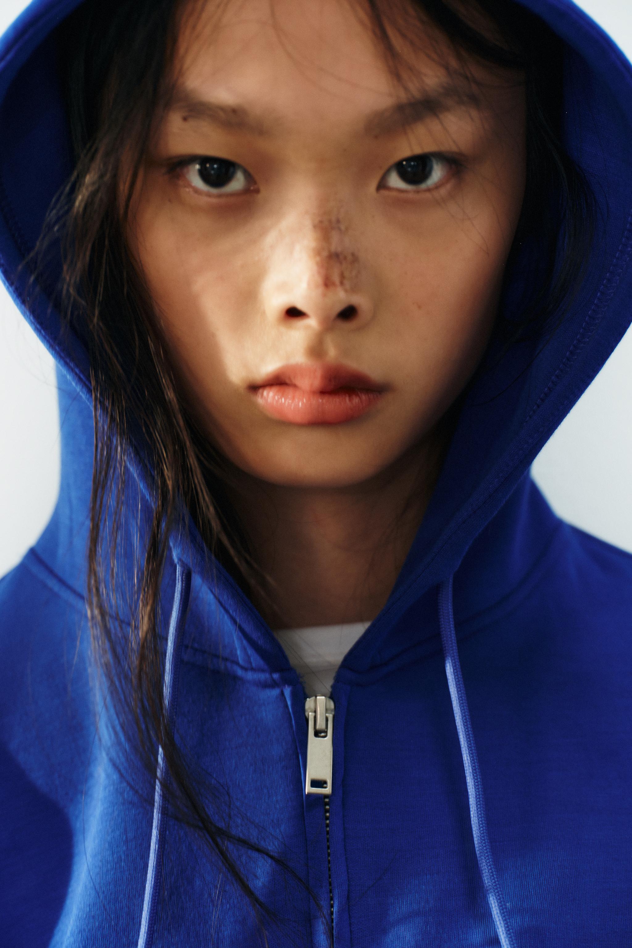 SWEAT INTERLOCK À CAPUCHE