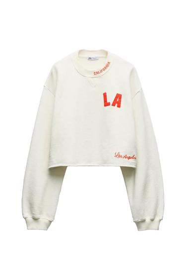 PLUSH VARSITY SWEATSHIRT WITH SLOGAN