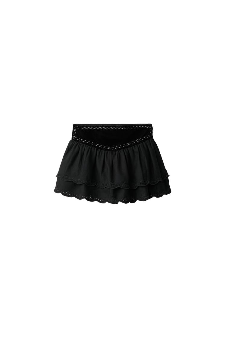Falda velvet tachas