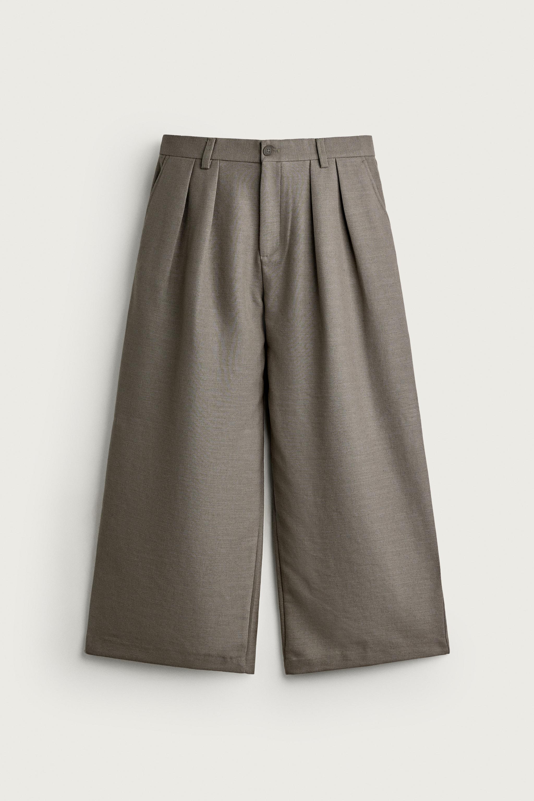 RELAXED FIT STRUCTURED PLEATED PANTS