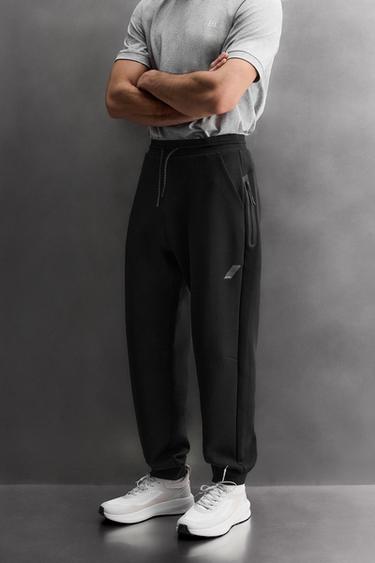 بنطلون تقني بسحاب - أسود الخاص بـ Zara