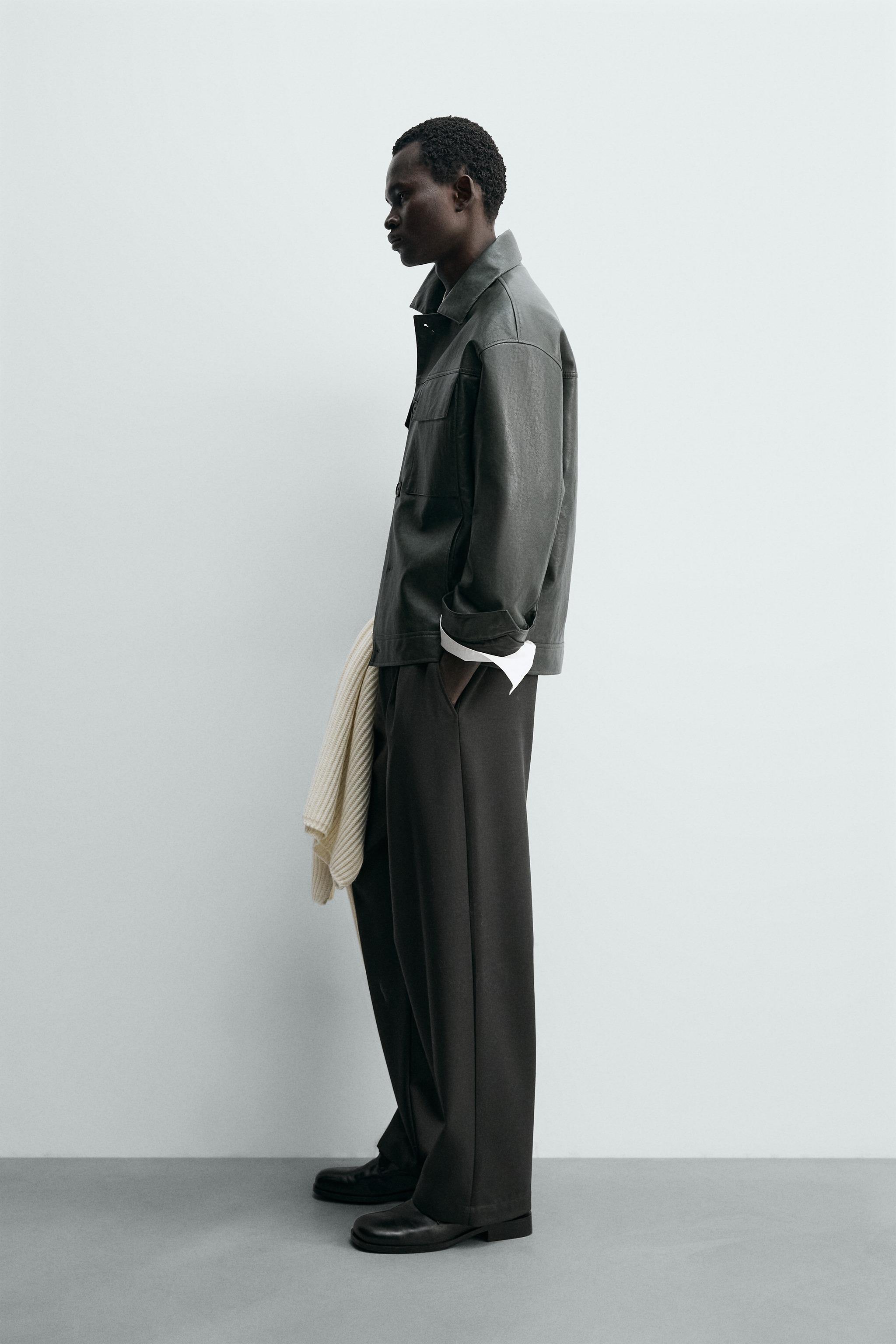 BLOUSON EN MATIÈRE SYNTHÉTIQUE