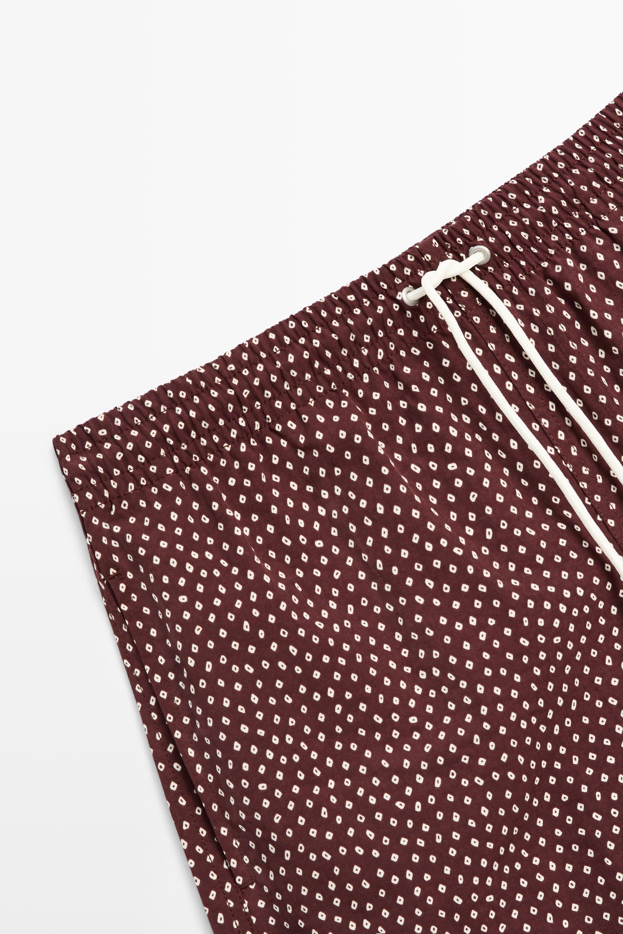 Polka dot print swimming trunks