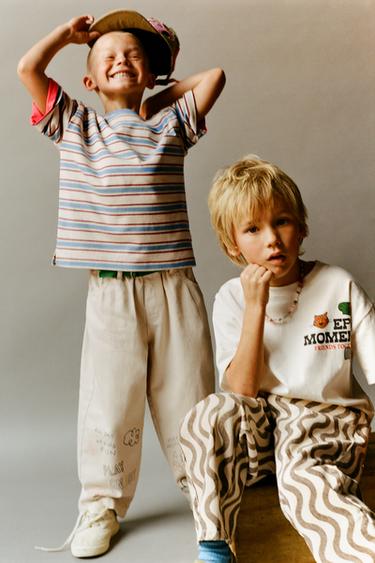 Zara VREĆASTE PANTALONE SA TEKSTUALNIM PRINTOM – Ekru