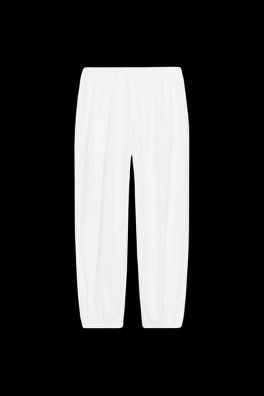 PANTALÓN FLUIDO BOMBACHO - Blanco de Zara - Imagen 0