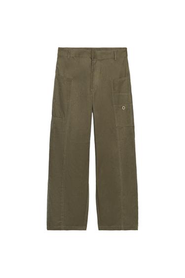 Front view of dark khaki cargo trousers with patch pockets on leg and back, front zip and button fastening.