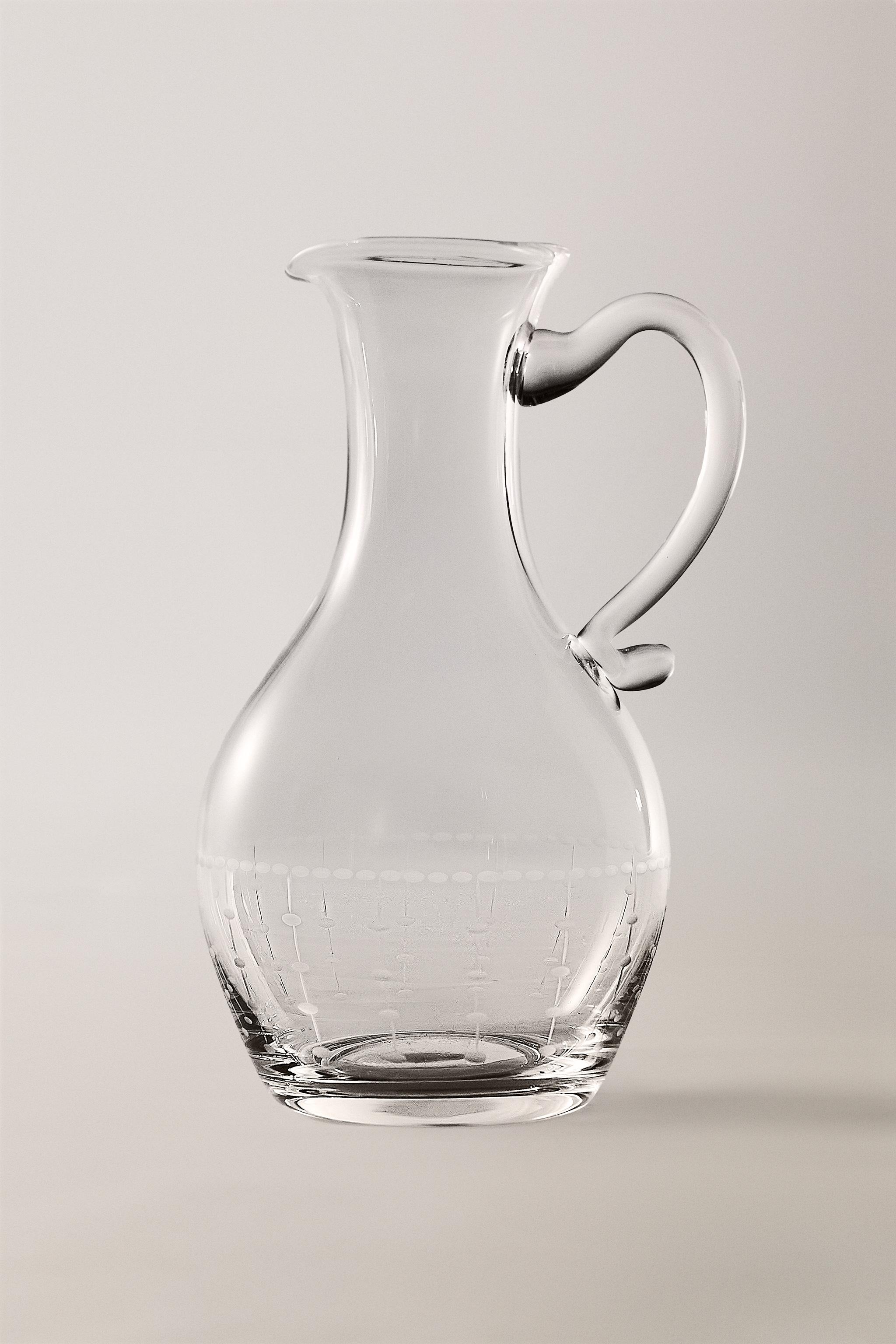 GEOMETRICALLY ENGRAVED GLASS PITCHER