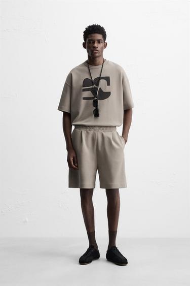 INTERLOCK PLEATED BERMUDA SHORTS - Stone by Zara - Image 0