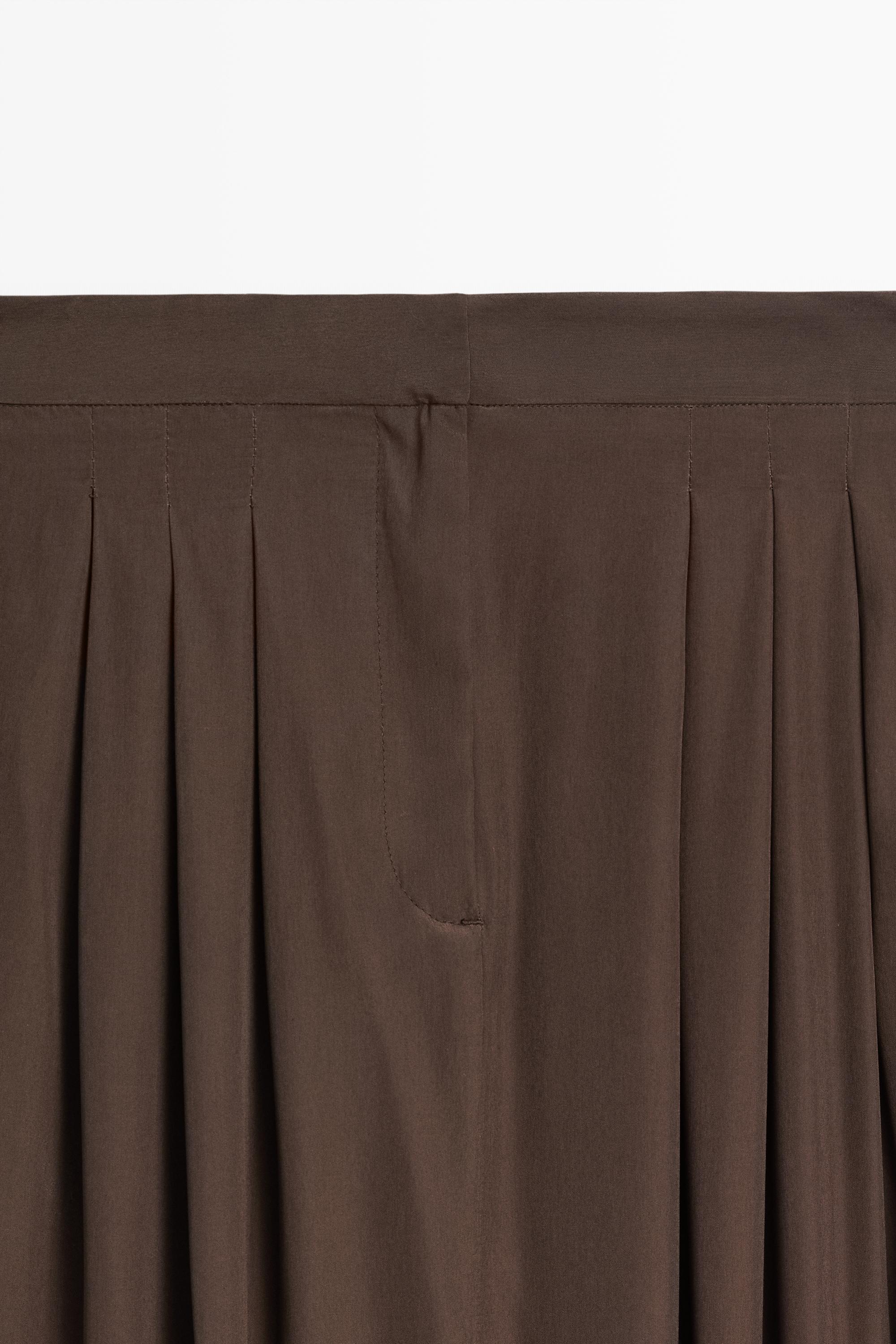 Flowing pleated midi skirt