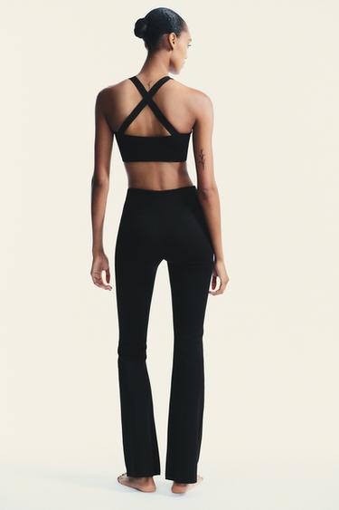 SEAMLESS POLYAMIDE FLARE TROUSERS - Black by Zara - Image 4