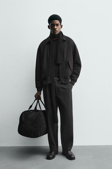 سترة مبطنة بمظهر جلد الغزال - أسود by Zara