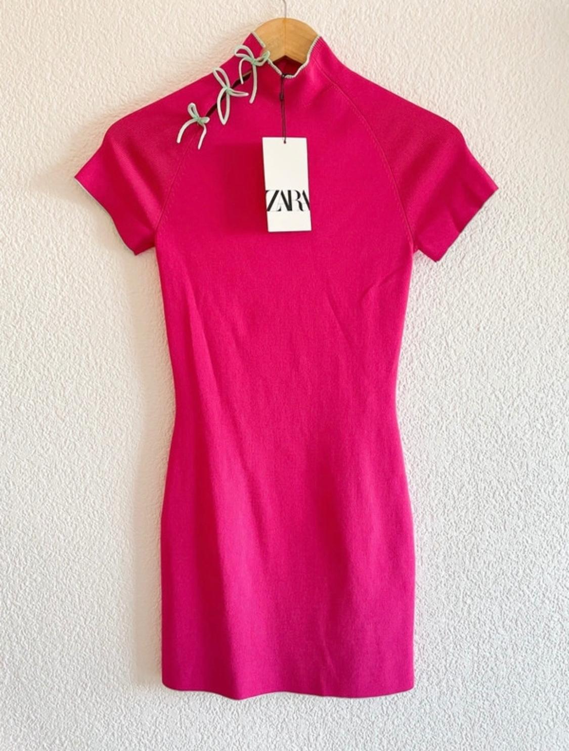 KNIT DRESS WITH BOWS