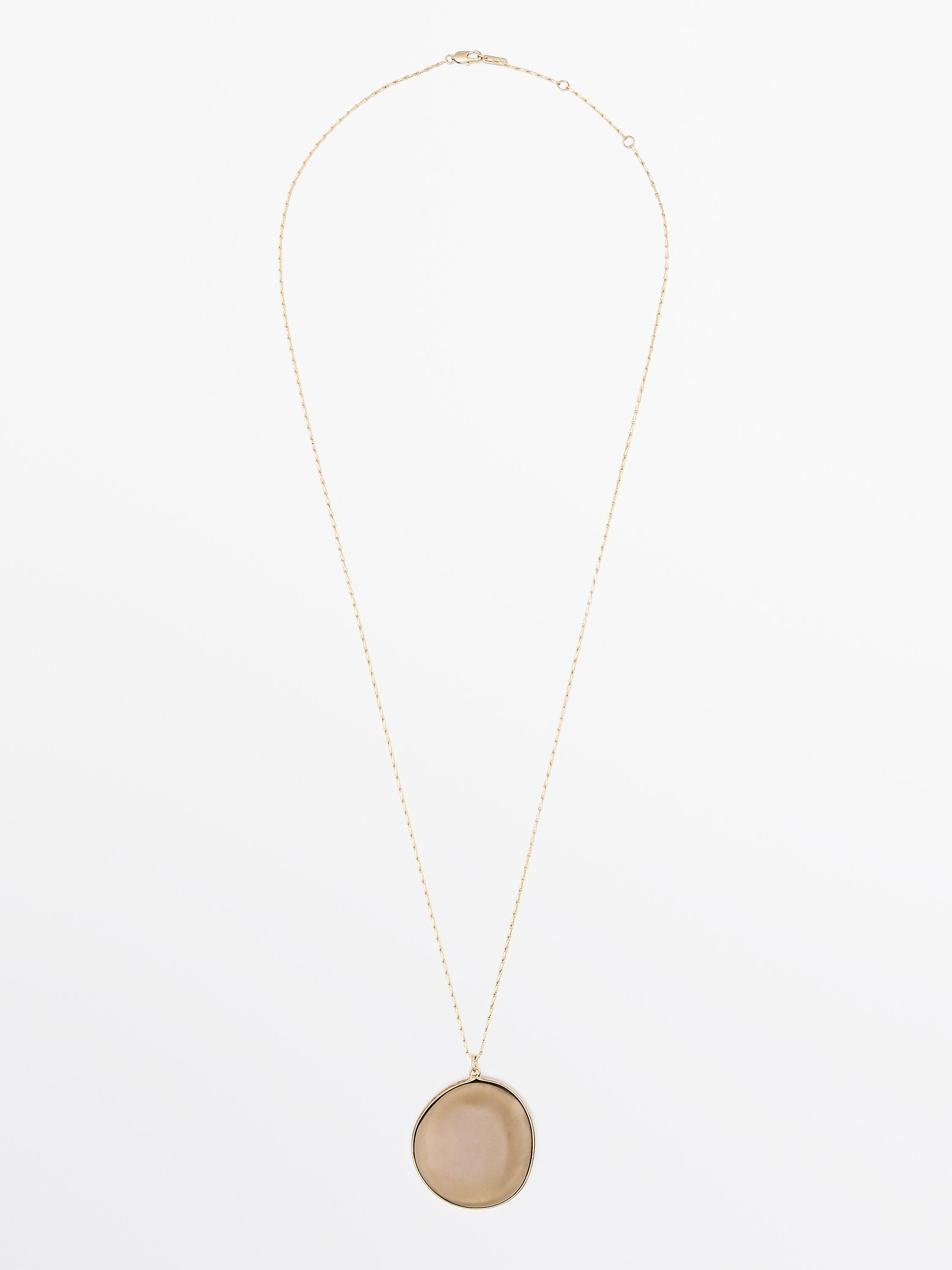 Necklace with translucent stone pendant