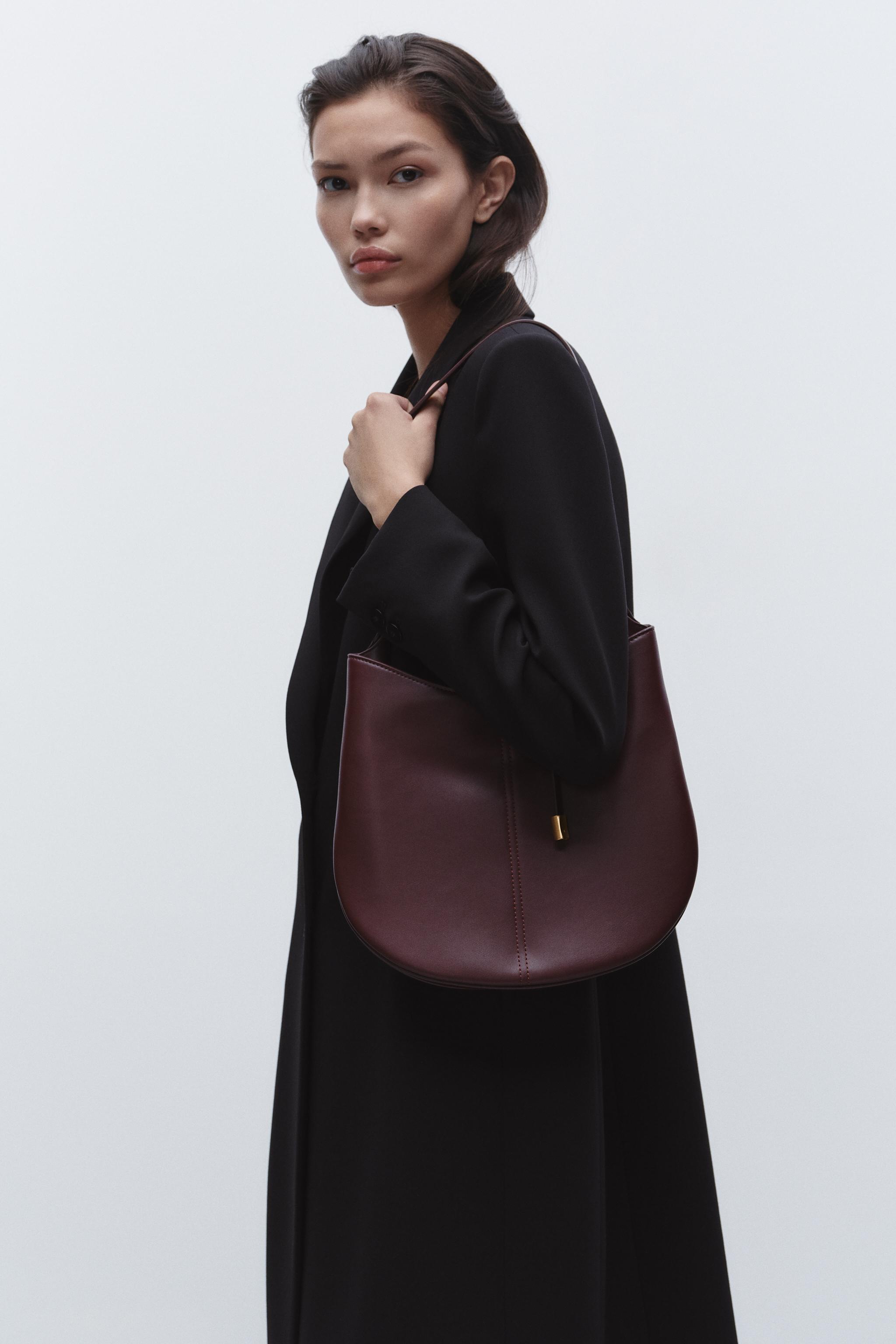 RUST PAINTED BUCKET SHOULDER BAG