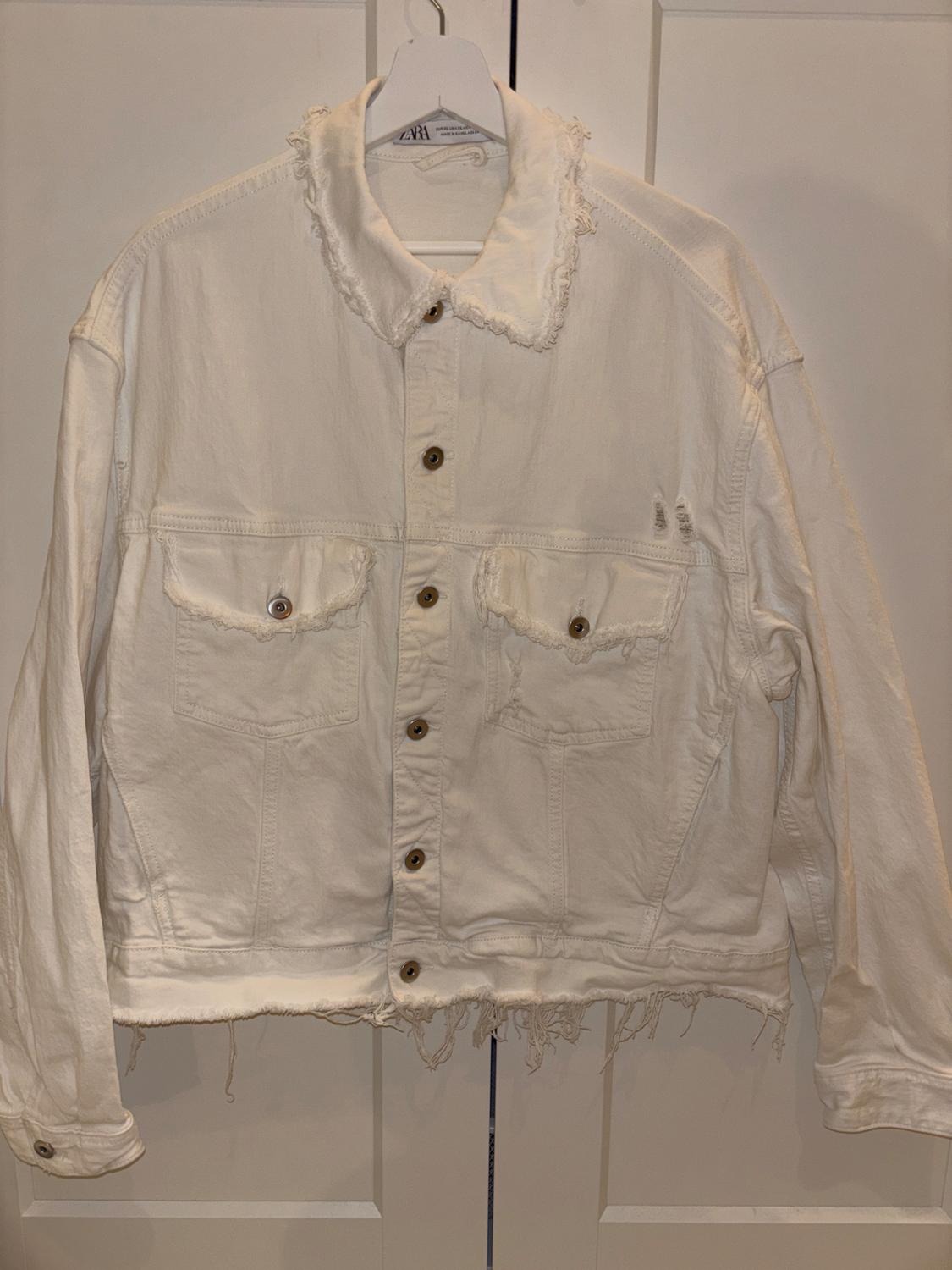 JACKET WITH IRREGULAR TRIMS