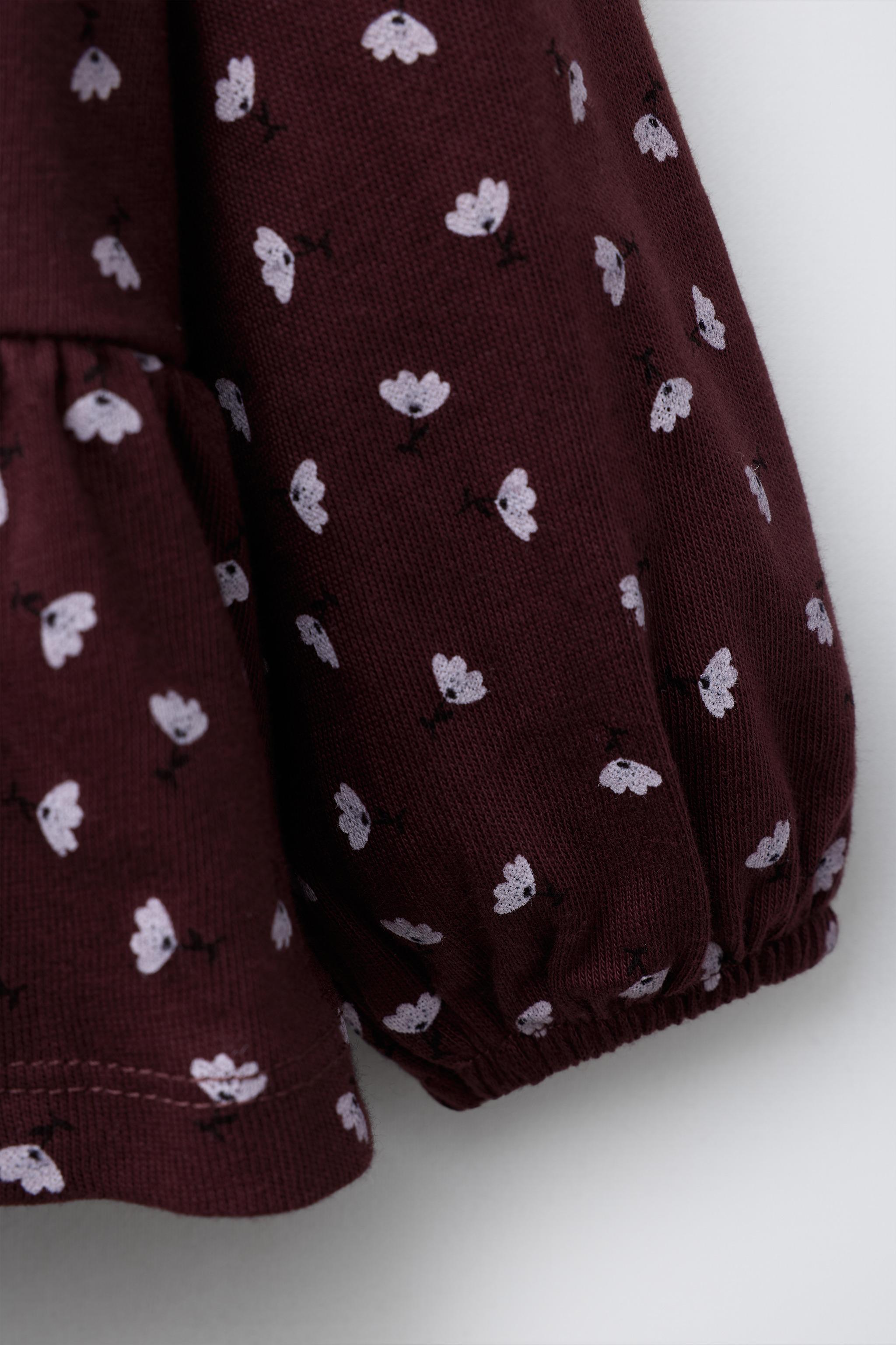 HAUT À FLEURS AVEC NŒUD EN VELOURS