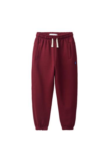 PANTALON DE JOGGING EN MOLLETON UNI AVEC ÉTIQUETTE - Grenat de Zara