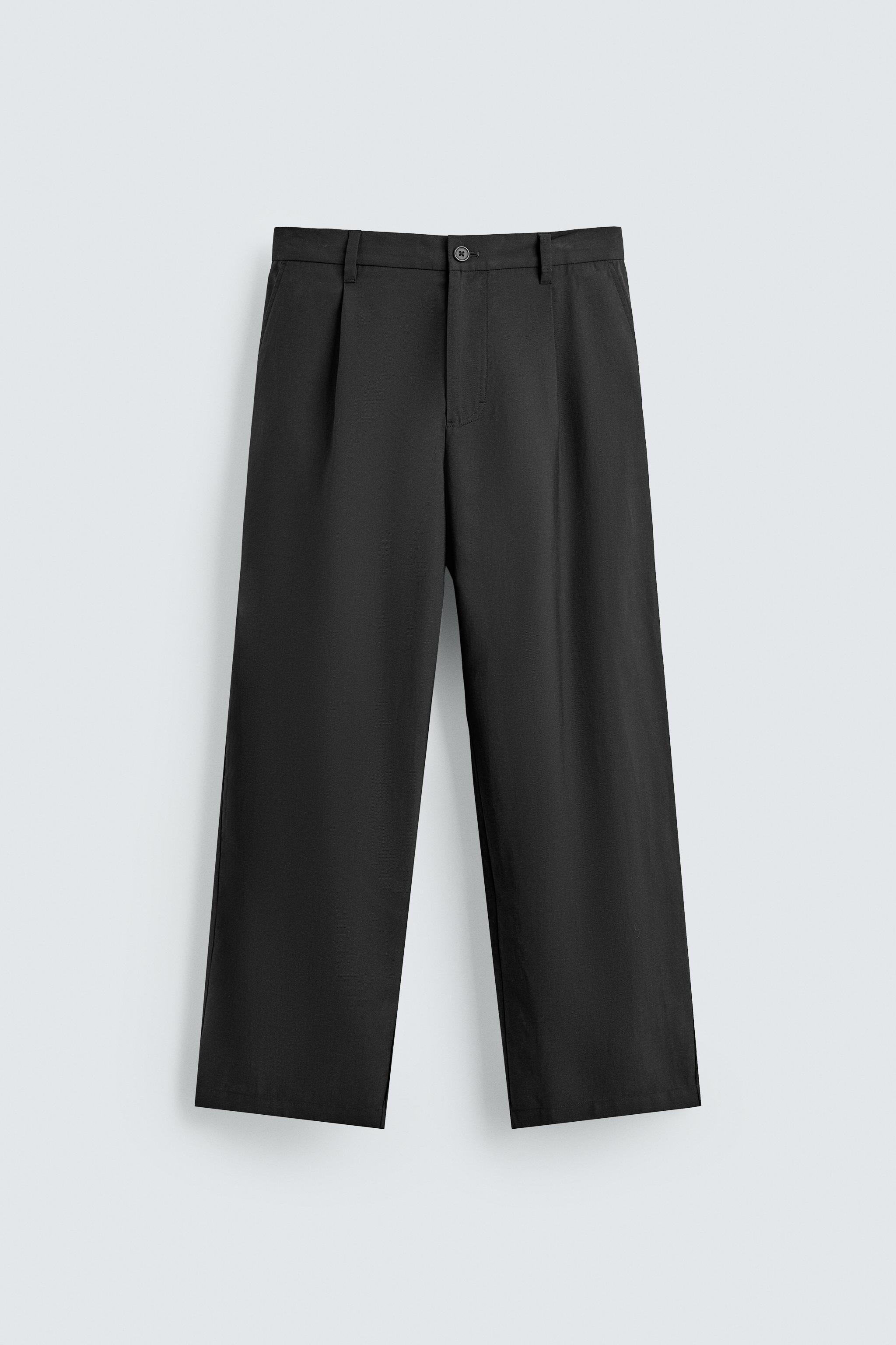 FLOWY PLEATED PANTS