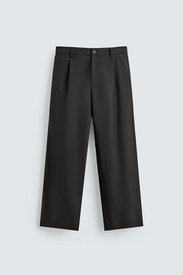 بنطلون منسدل بثنيات - أسود الخاص بـ Zara